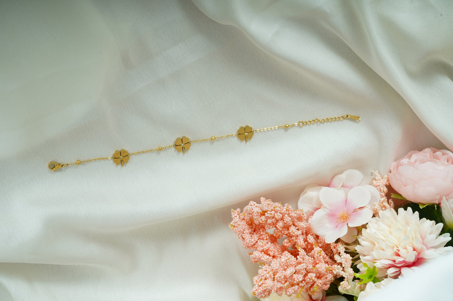 Three flower bracelets