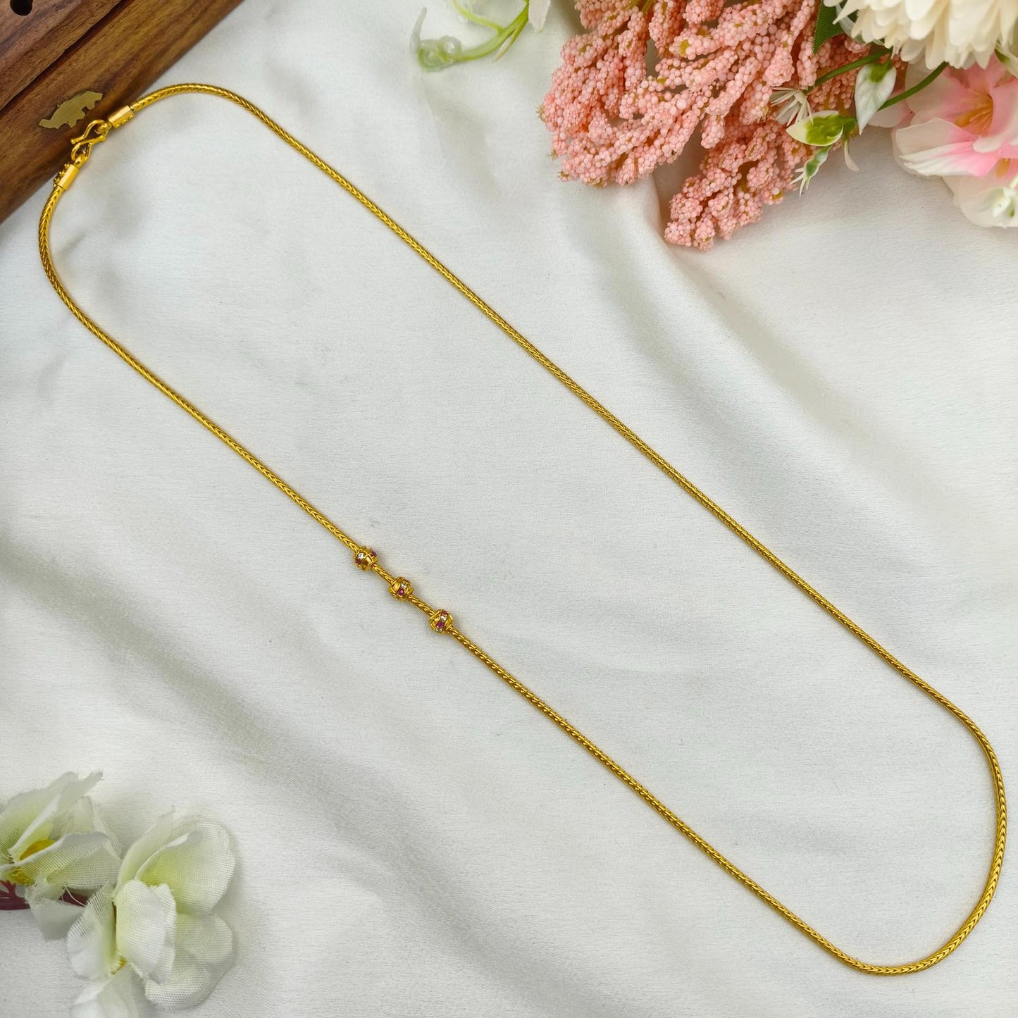 Tiny gold ball mop chain