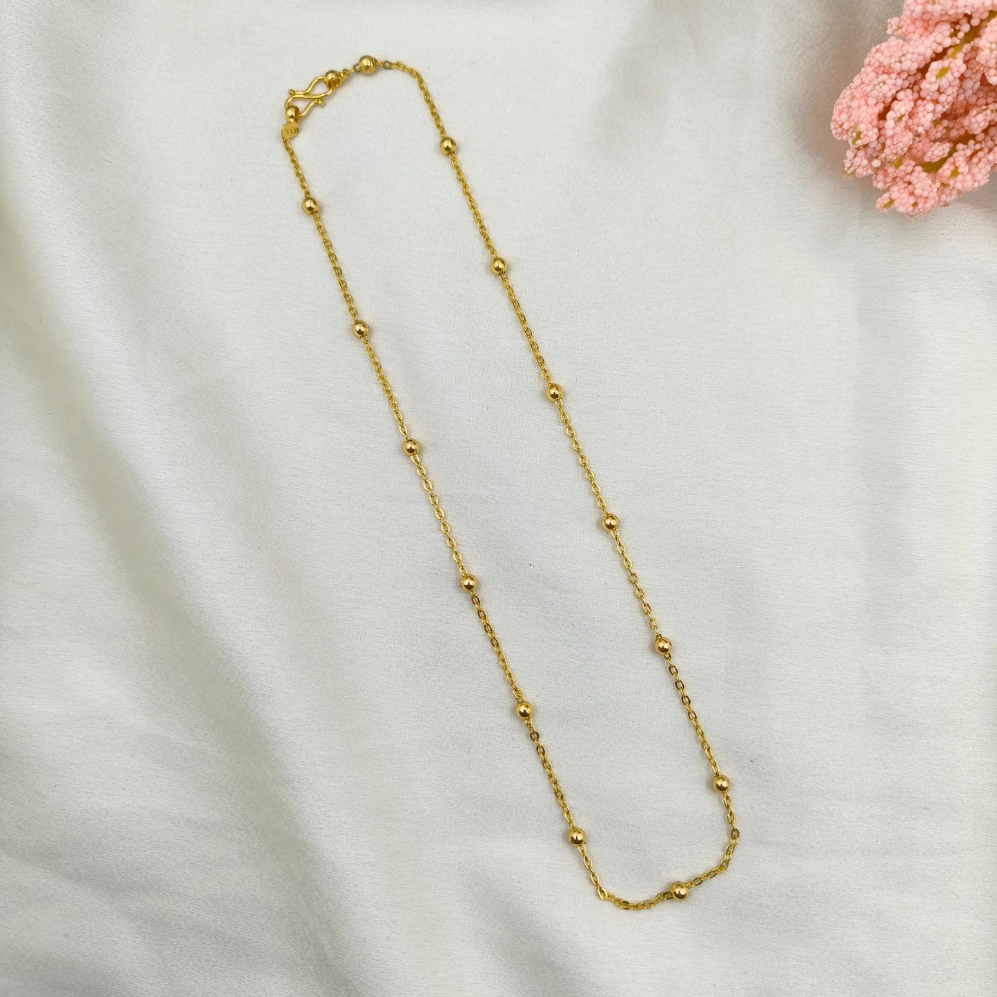 Inter link ball chain