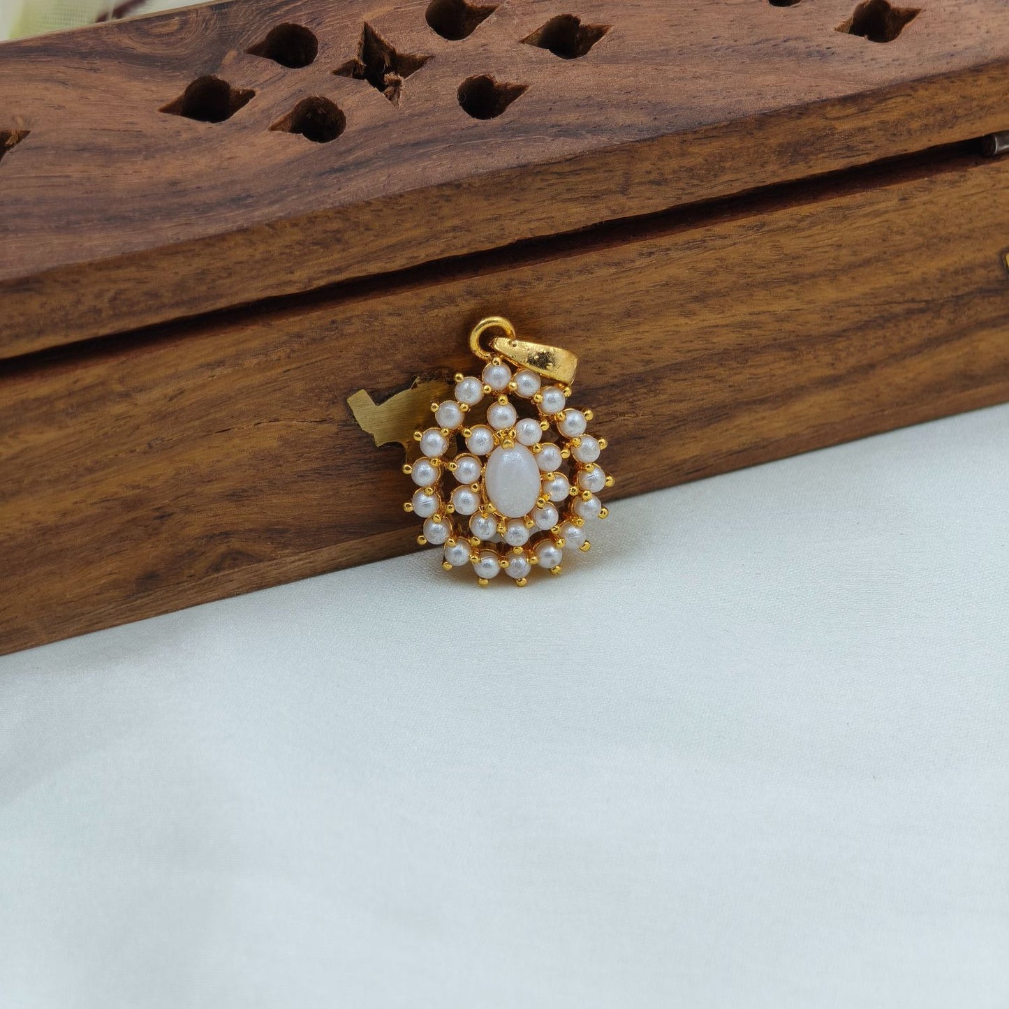 Cute tiny pearl pendant