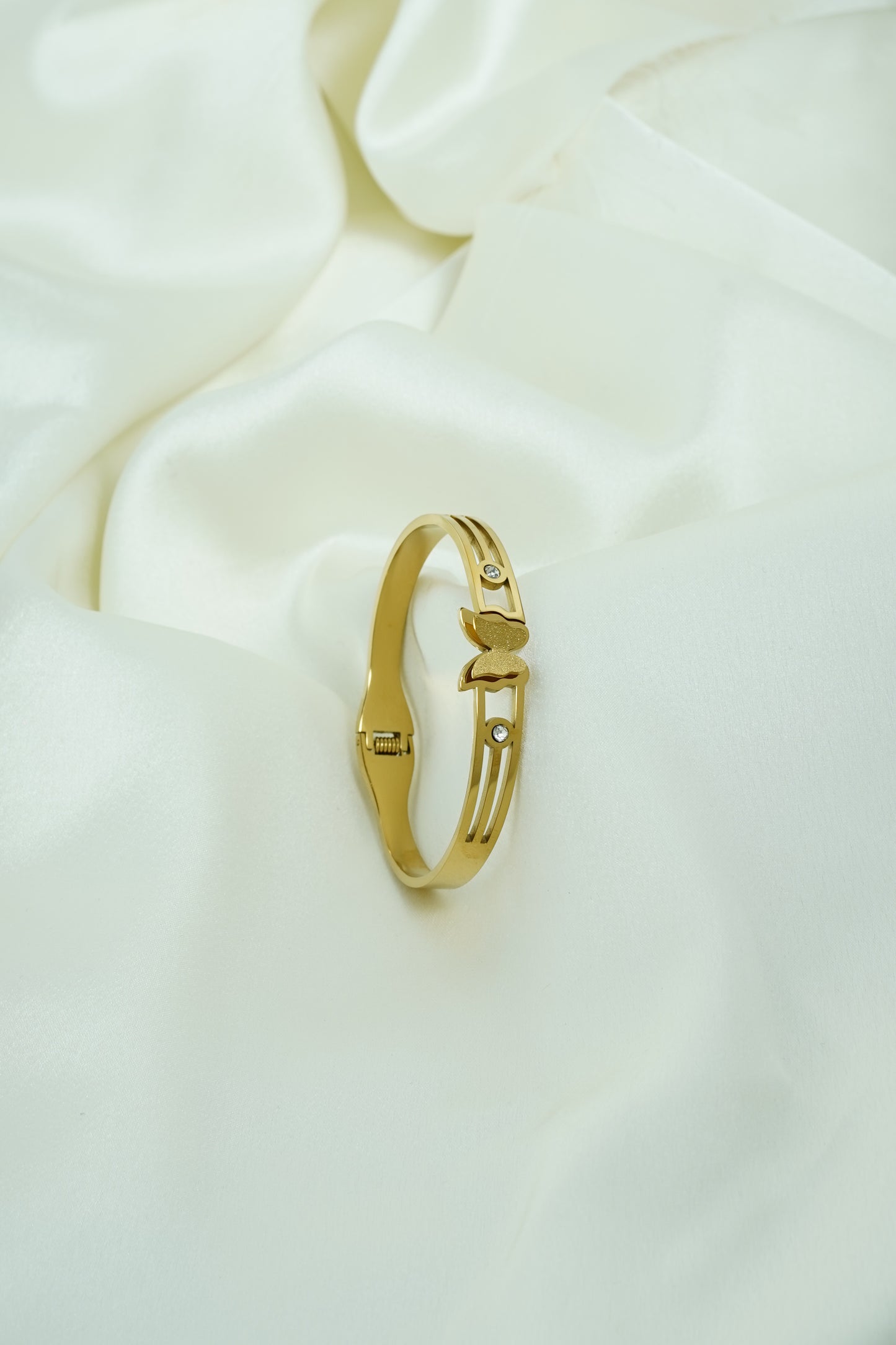 Center stone butterfly gold