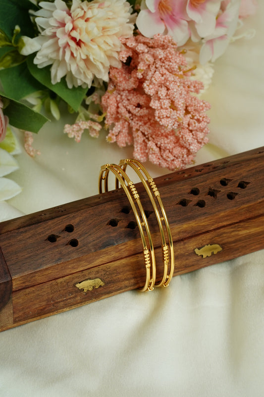 Two layer cut bangle