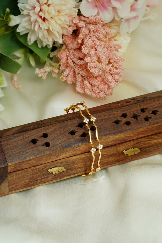 Four stone flower bangle