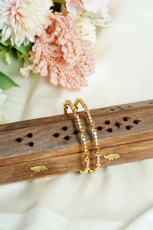 Four stone S bangle