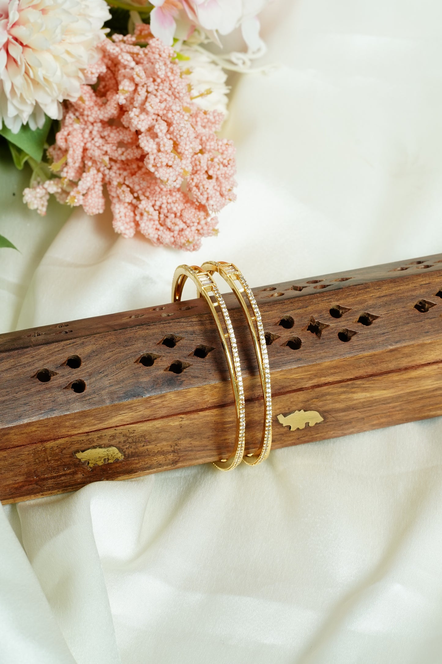 Wave cross bangle
