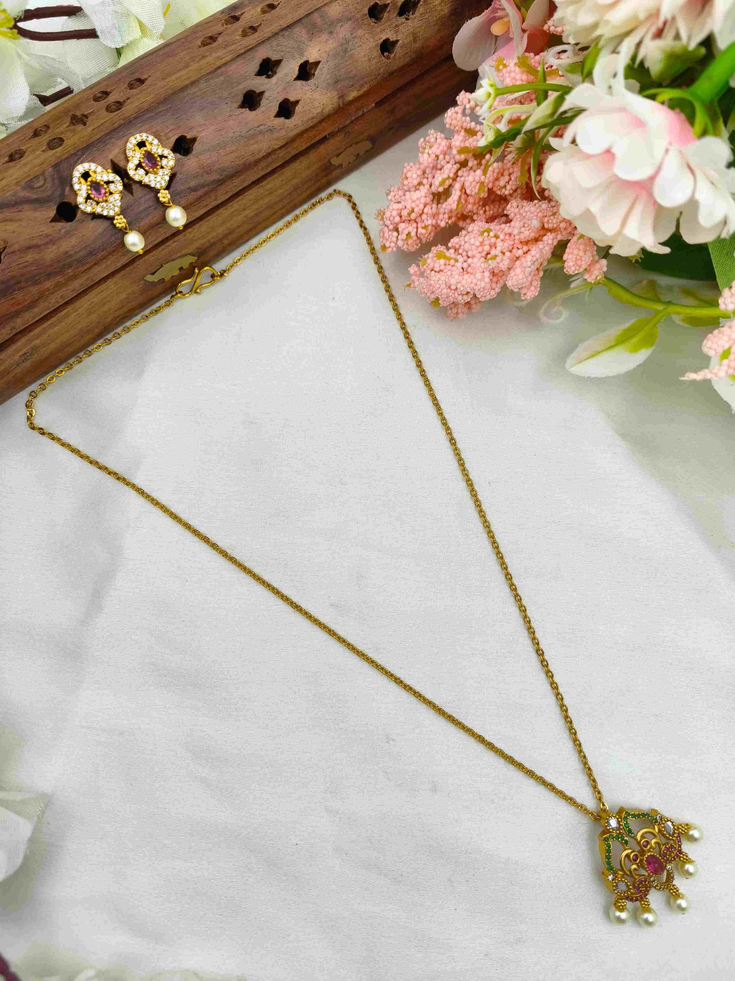 Ruby peacock pearl hanging chain
