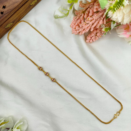 White with red three ball mop chain
