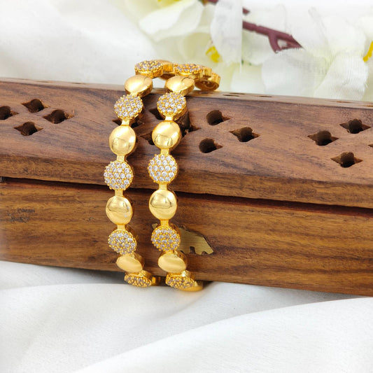 Round gold and diamond bangle