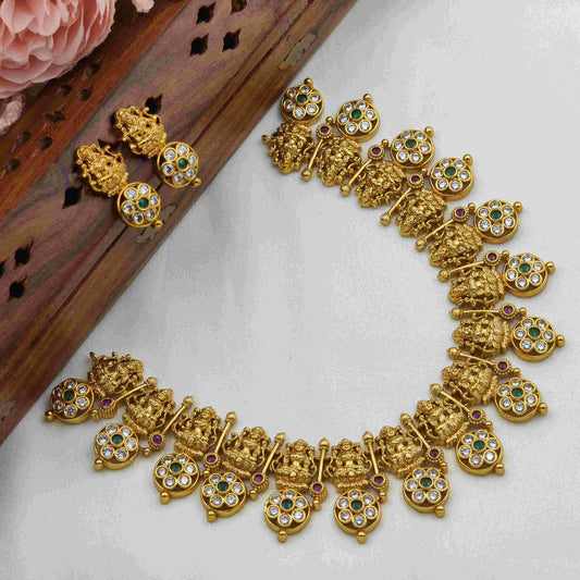 Lakshmi with flower necklace